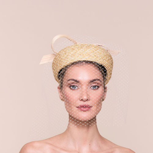 a special occassion vintage style straw beret with a trimmed millinery veil