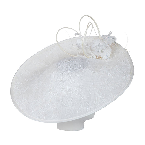 White decorative hat with lace details on a white background