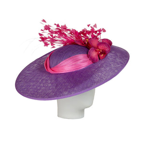 Purple ladies derby hat with pink decorative elements on a white background